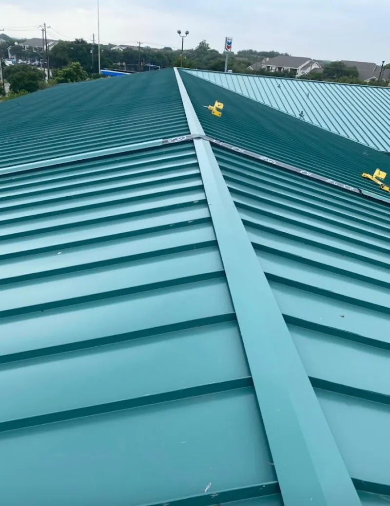 Green commercial metal roof ridge and valley for Metal Roof Repair in Stratham