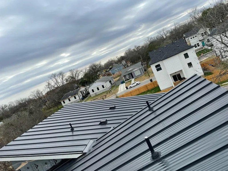 Standing seam metal roof panels with vents for Skylight Repair in Stratham
